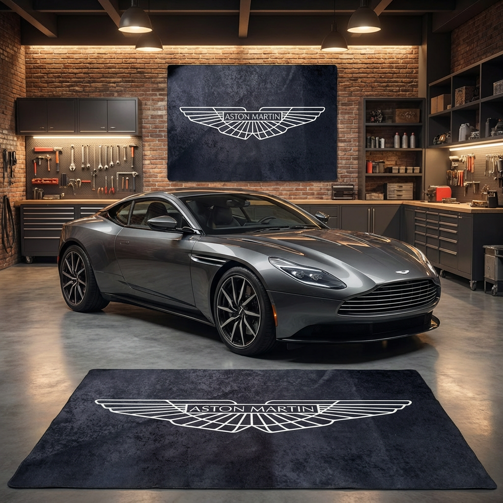 Premium Aston Martin wings logo floor rug, 150x220cm (approx. 5x7ft), with anti-slip backing displayed in a luxury British car studio.