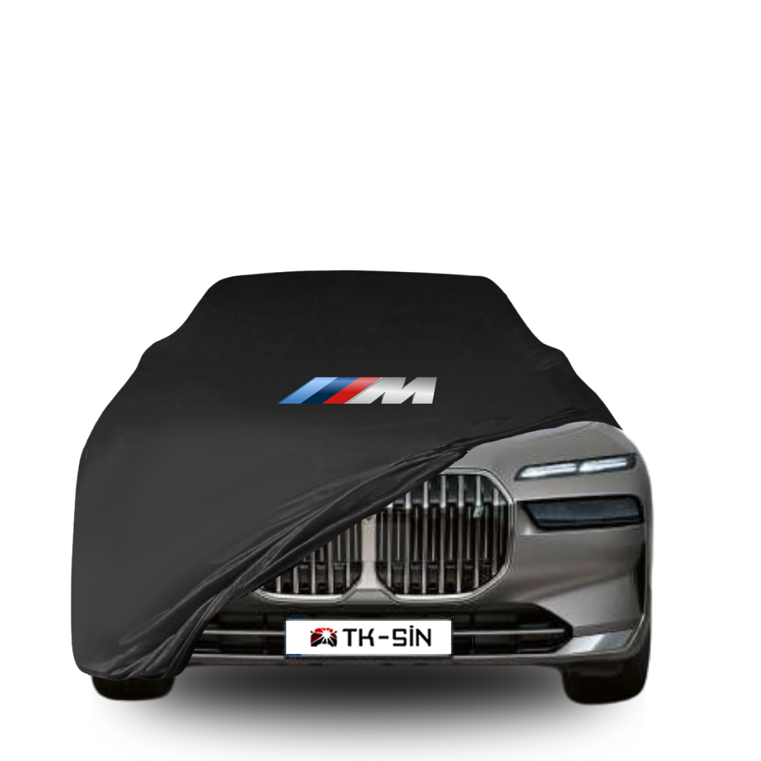 BMW i7 fitted with a bespoke indoor car cover in a UK garage