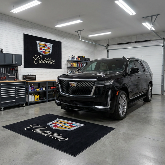Large Cadillac crest logo floor rug, 150x220cm (approx. 5x7ft), with non-slip backing, displayed in a high-end modern garage.