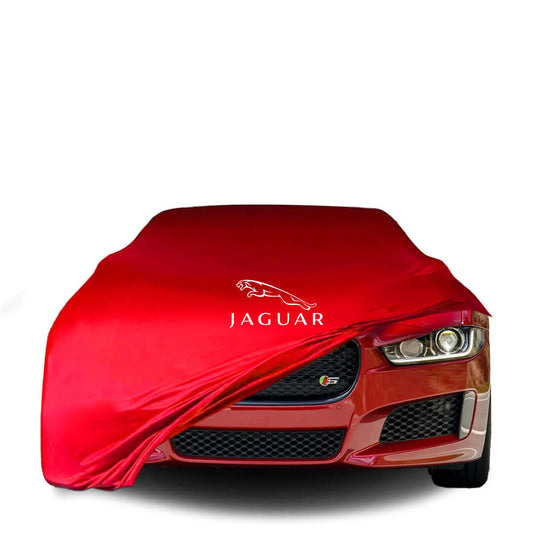 Jaguar XE fitted with a bespoke indoor car cover in a UK garage