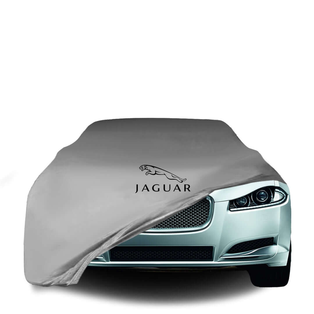 Jaguar XF fitted with a bespoke indoor car cover in a UK garage