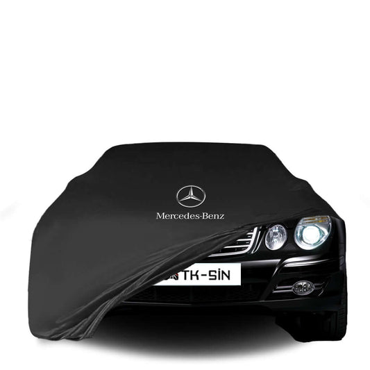 Mercedes-Benz E-Class W211 fitted with a bespoke indoor car cover in a UK garage